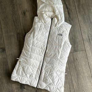 The North Face vest puffer vest size medium, women’s white long